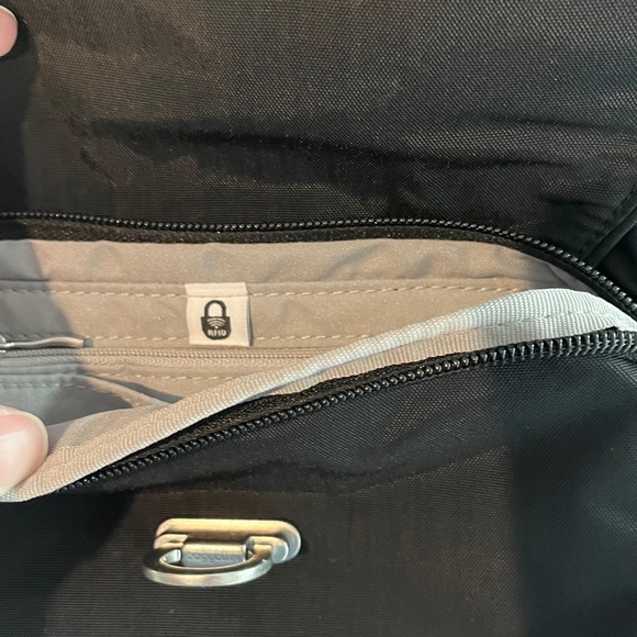 Baggallini Coastal Flip Lock Camera Crossbody Bag in black nylon. RFID - Picture 3 of 7